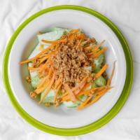 Cucumber Salad · Cucumber, carrot, crushed peanut in rice vinegar dressing to refresh the palate.