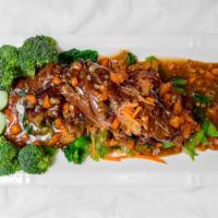 Duck Garlic · Boneless roast duck with garlic sauce and Chinese broccoli. Entrées do not include rice.