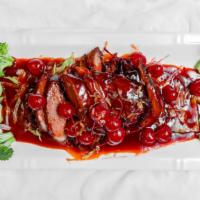 Cherry Duck · Crispy duck with red wine sauce. Entrées do not include rice.