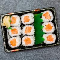 Salmon Roll · Seaweed, rice (vinegared), salmon, soy sauce, & wasabi on the side.