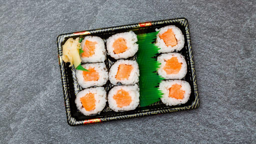 Salmon Roll · Seaweed, rice (vinegared), salmon, soy sauce, & wasabi on the side.