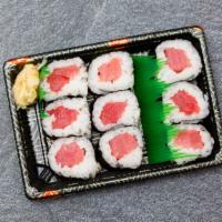 Tuna Roll · Seaweed, rice (vinegared), tuna, soy sauce, & wasabi on the side.