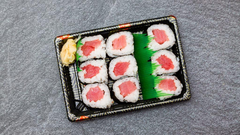 Tuna Roll · Seaweed, rice (vinegared), tuna, soy sauce, & wasabi on the side.