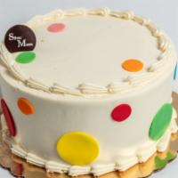 Polka Dot Cake · Three layers of vanilla cake with chocolate mouse filling and vanilla buttercream frosting.