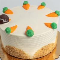 Carrot Cake · A deliciously traditional cake filled with carrots & raisins, moist and rich. 6