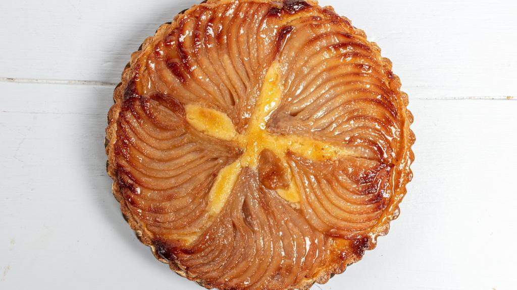Pear Tart · Flavorful Bosc pears atop frangipane filling, nestled in our famous rich butter crust.  This tart does not require refrigeration.