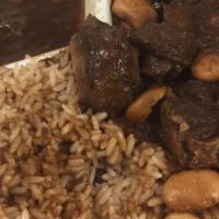 Oxtail · Succulent mouth watering oxtails with rice & peas or white rice with plantains is indeed God...