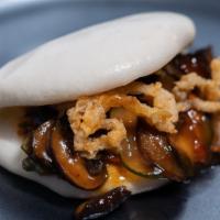 Mushroom Bun · Hoisin exotic mushroom blend w/ kimchi pickles & tumbleweed onions.