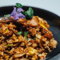 Black Garlic Chicken Fried Rice · House Bacon & Kimchi fried rice w/ Black Garlic Chicken