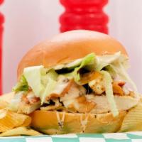 Spicy Chicken Sandwich · Grilled chicken tossed in buffalo sauce topped with mozzarella cheese, lettuce, and blue che...