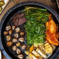 Beef Large Intestine (소대창) · Grilled beef large intestine + Rice Cake + Korean chives + Kimch + Onion +  Green Onion +Dae...