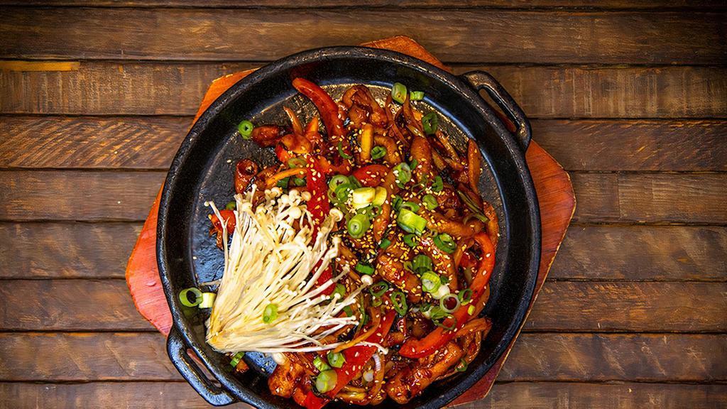 Spicy Stir Fried Small Intestine (매운 곱창볶음) - Single · Stir Fried small Intestine with Spicy sauce + Onion + Pepper + Mushroom + Green onion.
( All meats are fully cooked on a special Korean cast iron pan. )
