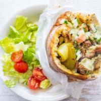 Chicken Shawarma In Pita · Cabbage/ Tomatoes/ Tahini Sauce