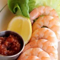 Shrimp Cocktail · Chilled shrimp served with traditional cocktail sauce and lemon