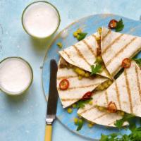 Spinach Quesadilla · Tortilla filled with onions, tomatoes & spinach with mozzarella cheese.