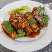 Jumbo Wings · Eight wings served with celery sticks.