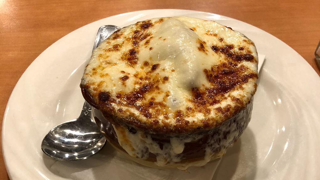 French Onion Soup · Crock of French onion soup with melted mozzarella.
