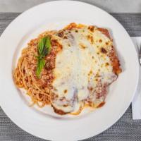 Chicken Parmigiana · Served with spaghetti.