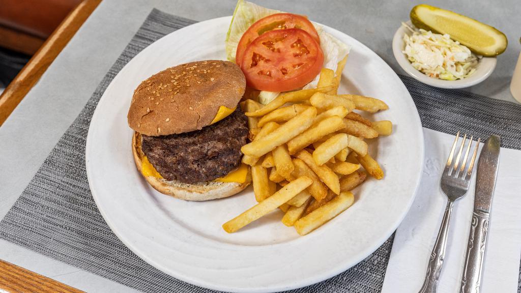 Cheeseburger Deluxe · Served with French fries, lettuce, tomato, coleslaw and pickle.