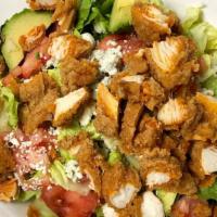 Buffalo Chicken Salad · Romaine lettuce, tomatoes, cucumbers, red onions, avocado, crumbled bleu cheese, tangy buffa...