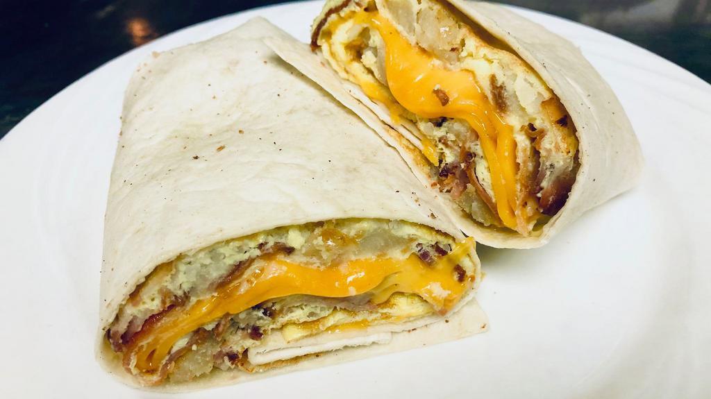 Ridge Wrap Sandwich · Scrambled eggs, home fries, bacon and choice of cheese.