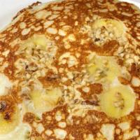 Banana Nut Pancakes · Served with butter and syrup.