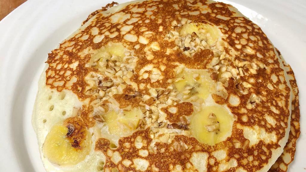 Banana Nut Pancakes · Served with butter and syrup.