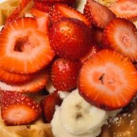 Waffle With Fresh Strawberries · Served with butter and syrup.