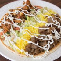 Dream Monster · Mixed lamb & beef, gyro, chicken, & rice. Includes crispy lettuce, cucumber, fresh tomatoes,...