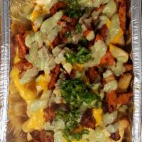 Loaded Fries · Al pastor / chicken / steak with cheese, cilantro, guac sauce