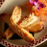 Nid Spring Rolls · Carrot, cabbage, taro and clear bean noodles wrapped in spring roll skin, fried and served w...