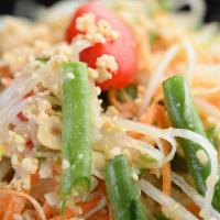 Papaya Salad · Shredded green papaya, carrot, grape tomatoes and string bean lightly pounded in a mortar wi...