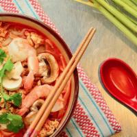 Tom Yum Noodle Soup · Spicy. Spicy Thai herbal soup, gluten-free rice noodle, minced chicken, shrimp, and mushroom.