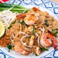 Pad Thai · Chonburi style. Rice noodle stir fried with scallions, bean spouts, egg and ground crushed p...