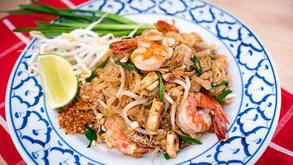Pad Thai · Chonburi style. Rice noodle stir fried with scallions, bean spouts, egg and ground crushed peanuts.
