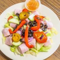 Antipasto Salad · Ham, salami, provolone, capicola, over a garden salad.