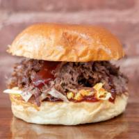 Pulled Ribeye · Slow Cooked Ribeye, Home Made Coleslaw, BBQ Sauce.