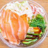 Poke Bowl · Served with crab meat, avocado, seaweed, salad, lettuce, carrot, masago and rice.