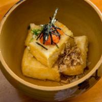 Agedashi Tofu · Japanese tofu lightly fried in a thin batter. Served with ginger soy dipping sauce.