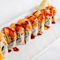 Shrimpy · Shrimp tempura and cucumber on the inside topped with spicy tuna and eel sauce.