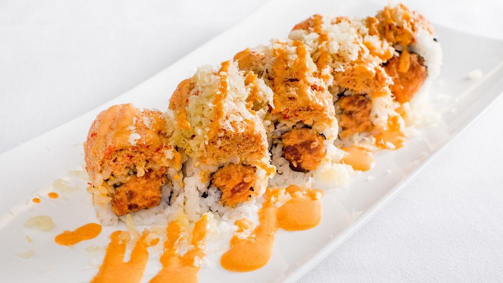 Blast · Spicy crunchy tuna and yellowtail on the inside, topped with spicy crunchy crab meat.