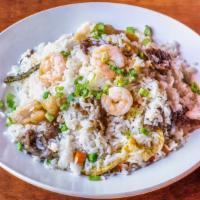 House Special Fried Rice · Combination of chicken, shrimp, beef, pork, eggs, peas and green onions.