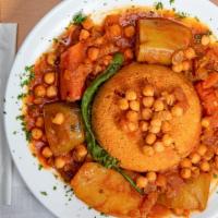 Couscous · A maghrebi dish of small steamed balls of crushed durum wheat semolina that is traditionally...
