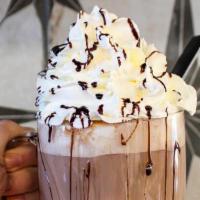Mom & Dad'S Hot Chocolate · white chocolate, dark chocolate, & steamed milk. topped with whipped cream.