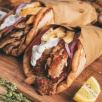 Chicken & Lamb Gyro · If you can't choose between the two, we have you covered. Perfectly seasoned chicken & lamb,...