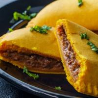 Jamaican Beef Patty · A Jamaican classic of spicy beef inside a thick and crispy pastry. Make it a cheese patty or...