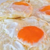 Dos Huevos Fritos O Revueltos / Two Eggs Fried Or Scrambled · 