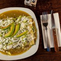 Enchiladas · Four corn tortillas filled with chicken, beef or cheese topped with cotija cheese, lettuce, ...