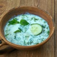 Cacik · Made with chopped cucumber blended with garlic, mint, dill, and yogurt.