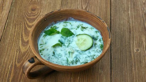 Cacik · Made with chopped cucumber, blended with garlic, fresh mint, dill, and yogurt.